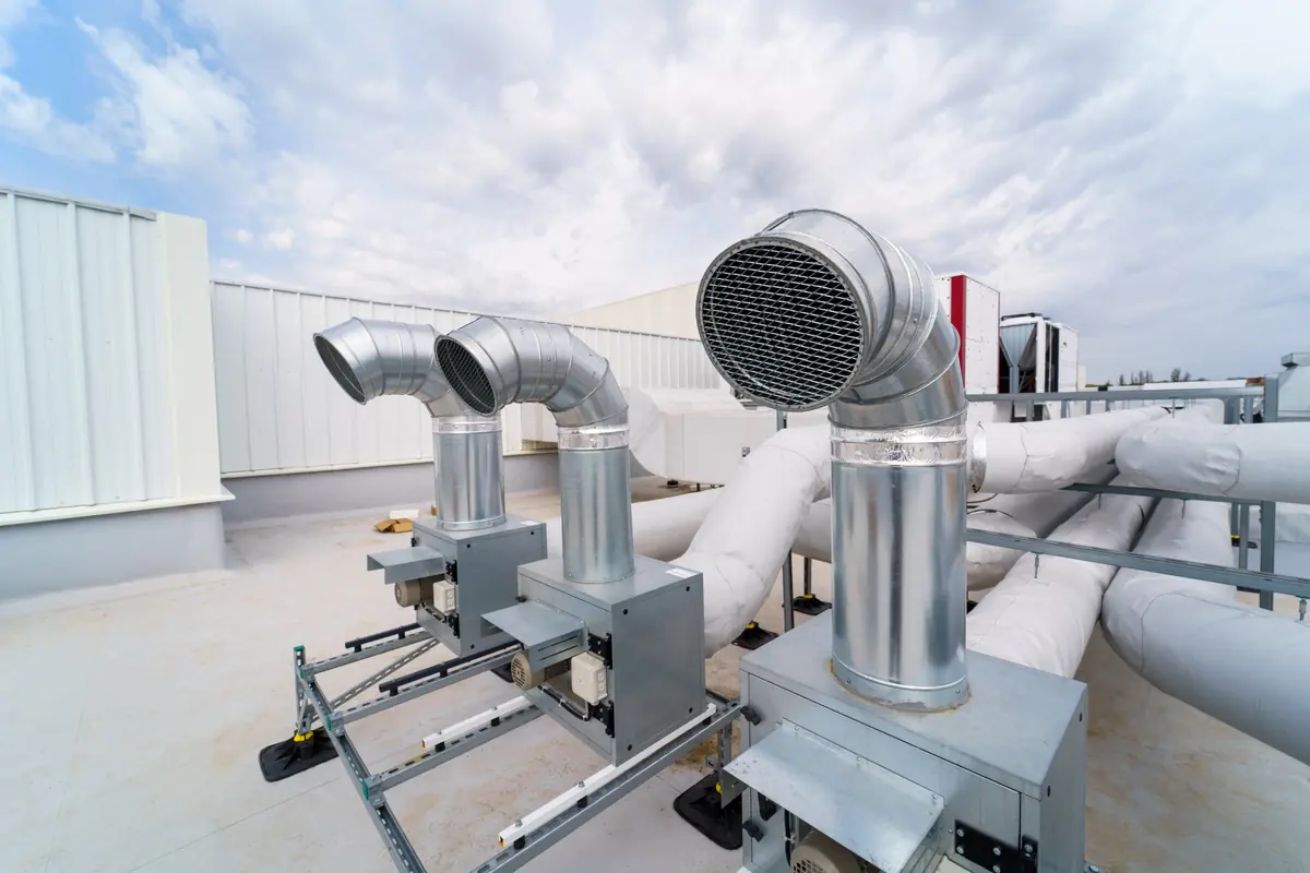 Sheet-metal ventilation ducts on an industrial building